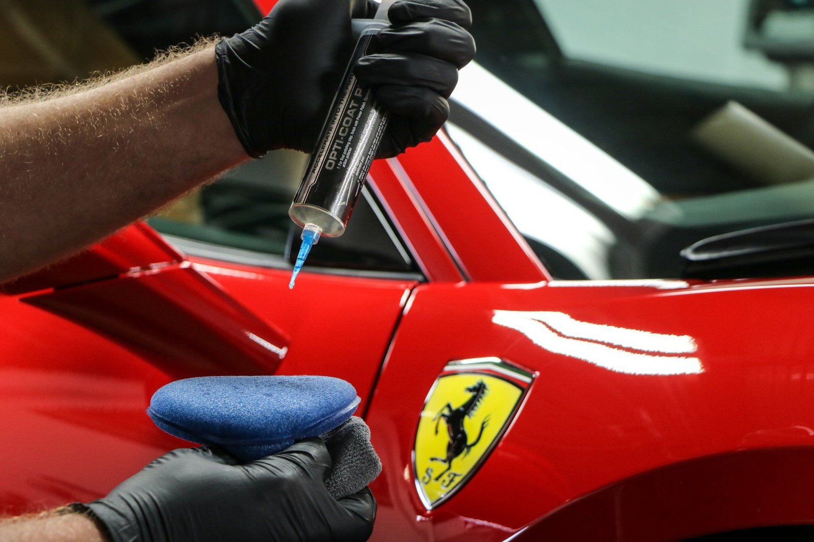 red Ferrari getting ceramic coated