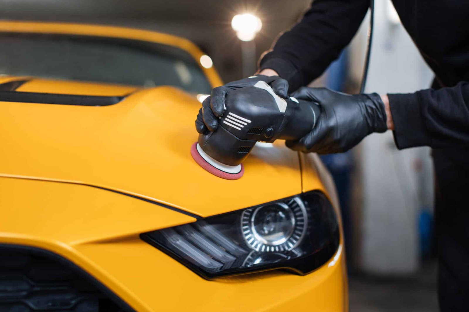 yellow car getting detailed