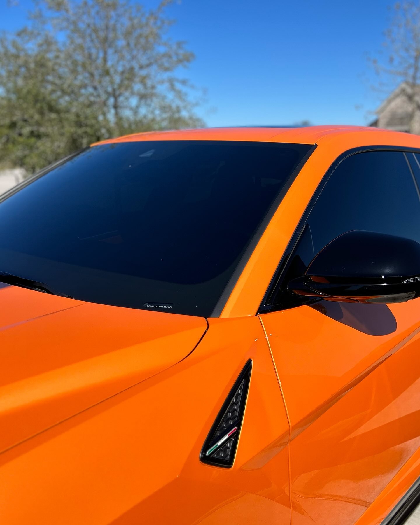 Orange car getting detailed